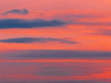 Amber Clouds At Twilight