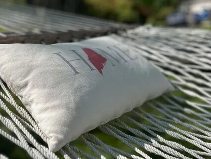 Lying In A Hammock And Relaxing In The Breeze