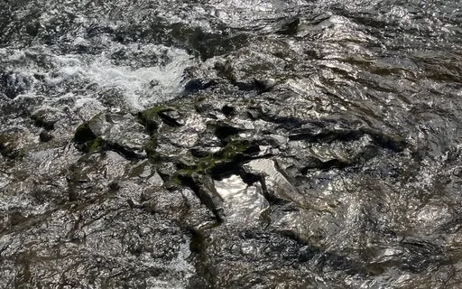 River With Waterfall Nearby
