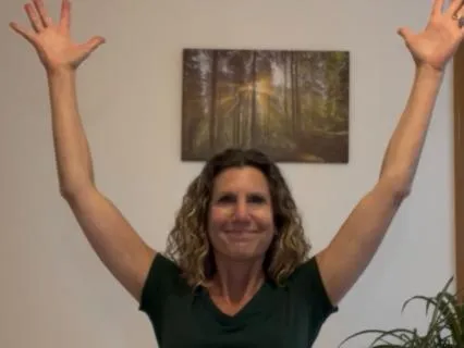 Seated Arm Circles With Foot Lifts