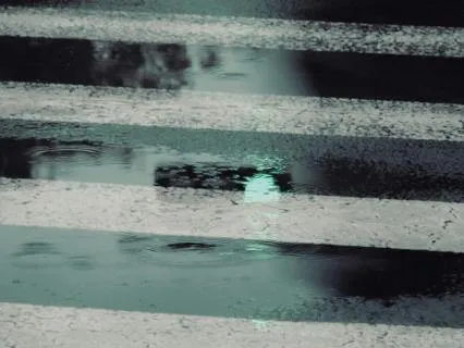 The Man At The Crosswalk