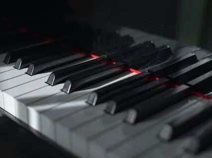 The Smallest Song Played On The Largest Piano