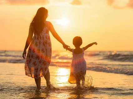 Walking With Inner Child On A Beach