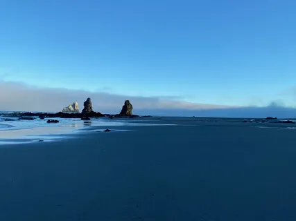 We Stand On The Shore At Dawn