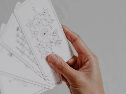 Weekly Tarotscope: April 14, 2025-Four Of Pentacles